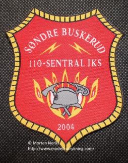 Søndre_Buskerud 110 sentral iks 2004 merke